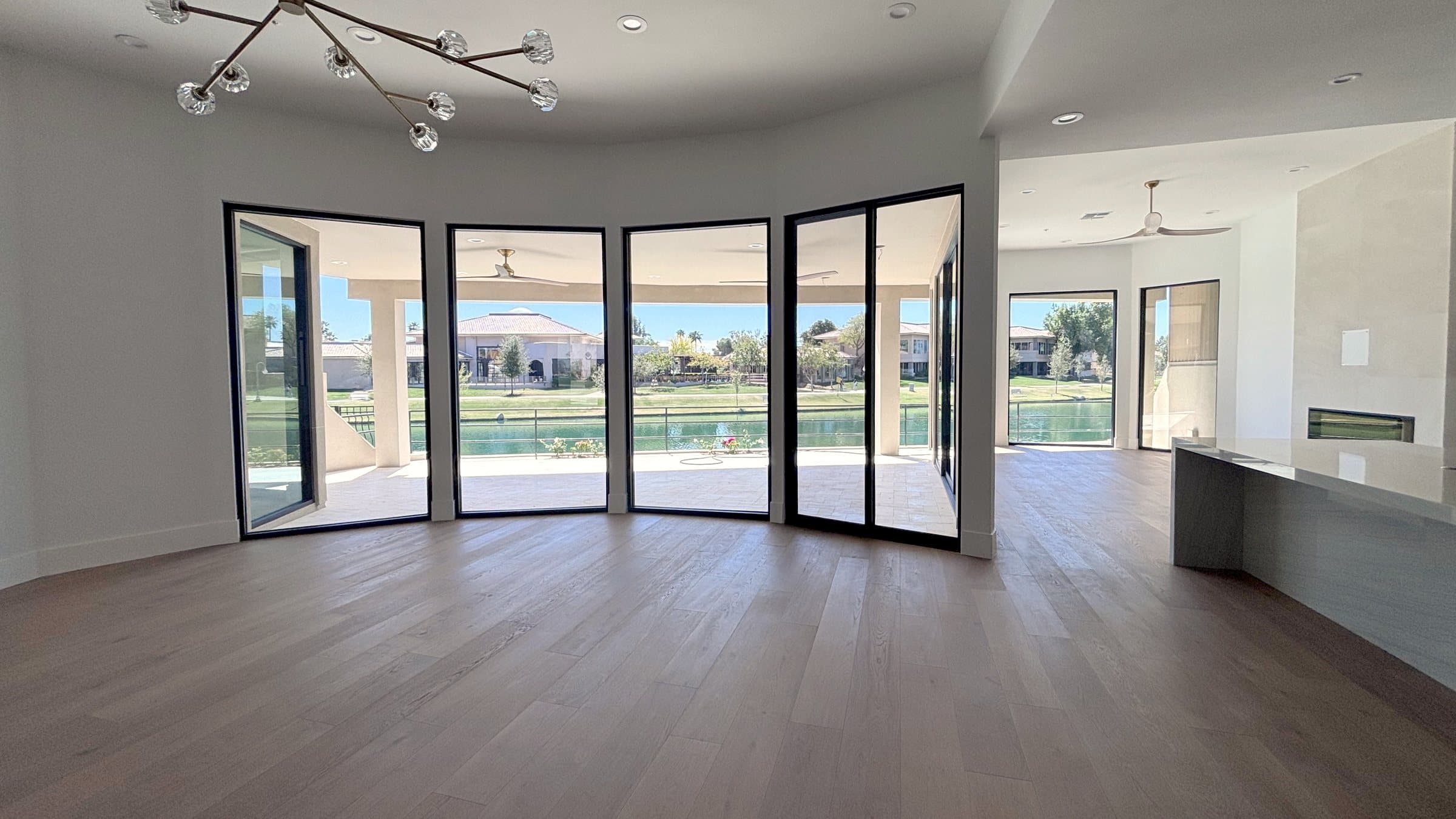 Montage of Radiant Wall installs: lakefront sliders, patio slider, picture windows, security door, shower glass, storefront and glass offices